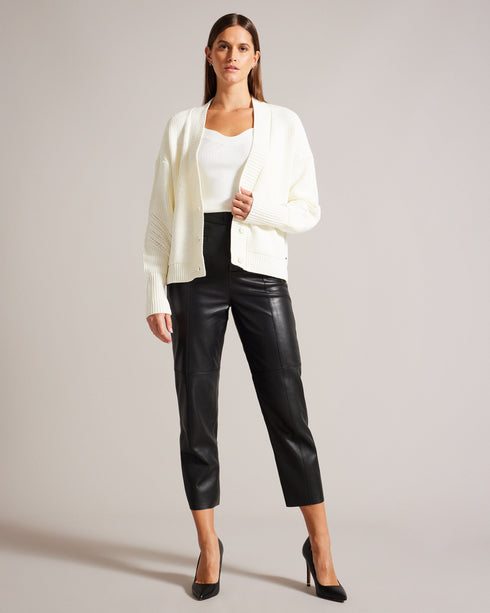 JOLALYY-Knitwear-Keep warm and comfortable in JOLALYY. Made from a cotton blend, this timeless cardigan is versatile enough to wear to brunch or throw over a tee for an extra layer on cooler days. Cardigan Relaxed fit Cotton blend Classic knit Ribbed Button fastening Deep V-neck Magnolia branded detail- Ted Baker Romania